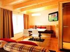 фото отеля AlpeLux Appartement an der Skipiste