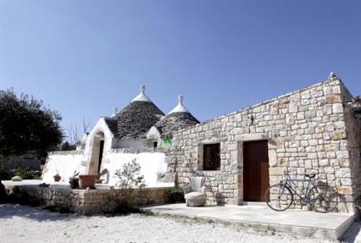 фото отеля Trullo Del Melograno Bed and Breakfast Castellana Grotte