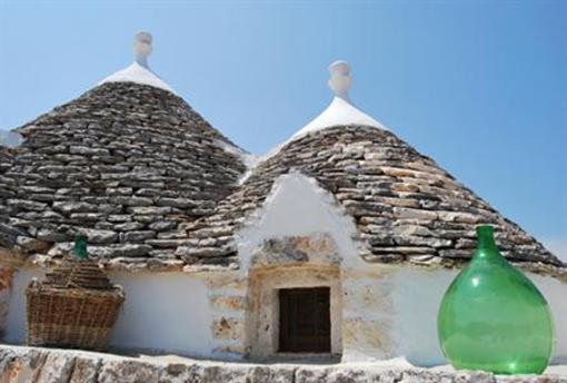 фото отеля Trullo Del Melograno Bed and Breakfast Castellana Grotte