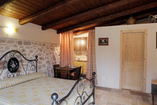 фото отеля Trullo Del Melograno Bed and Breakfast Castellana Grotte