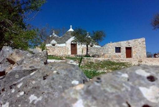 фото отеля Trullo Del Melograno Bed and Breakfast Castellana Grotte