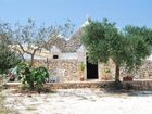 фото отеля Trullo Del Melograno Bed and Breakfast Castellana Grotte