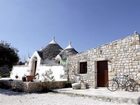 фото отеля Trullo Del Melograno Bed and Breakfast Castellana Grotte