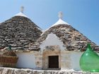 фото отеля Trullo Del Melograno Bed and Breakfast Castellana Grotte