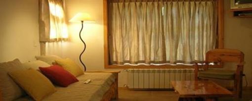 фото отеля Apart Hotel El Viejo Cipres San Carlos de Bariloche