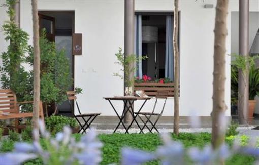 фото отеля Apartamentos Turisticos Patio De Viana