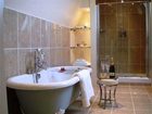 фото отеля The Coach House Boutique Bed and Breakfast