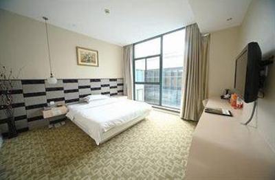 фото отеля Jiaxing Meiwan Moden City Hotel
