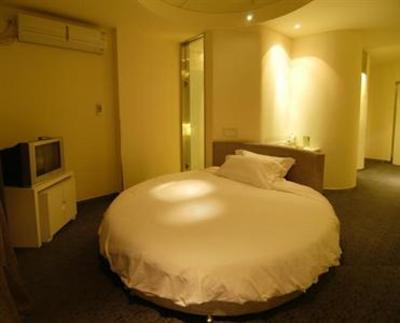 фото отеля Motel Inn Qionghua Plaza