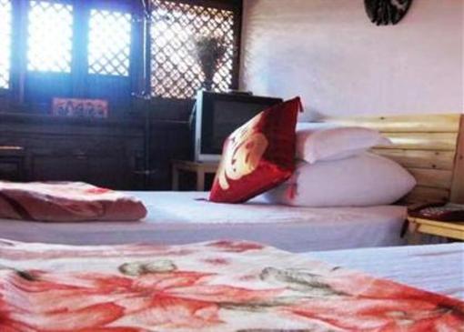 фото отеля Lijiang Overseas Inn