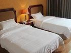 фото отеля Yikang Business Hotel