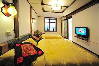 фото отеля Lijiang Loong House