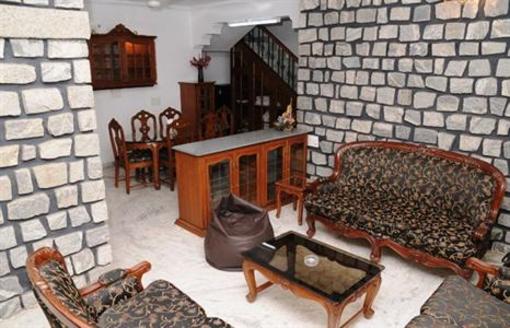 фото отеля Roxel Inn Favorite Chalet Bangalore