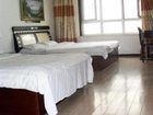 фото отеля Dalian Sea View Deluxe Apartment