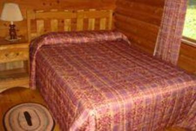 фото отеля Cajun Cedar Log Cottages