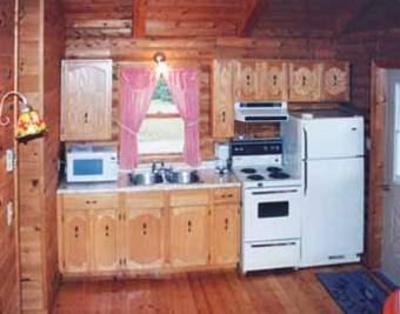 фото отеля Cajun Cedar Log Cottages