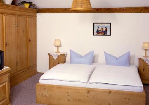 фото отеля Gastehaus Bergstuberl Reit im Winkl