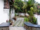 фото отеля Stain Glass Cottage Colva