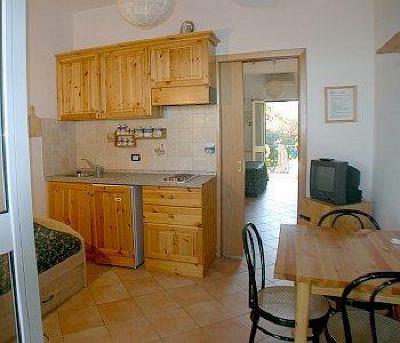 фото отеля Aparthotel Domus De Janas Sul Mare