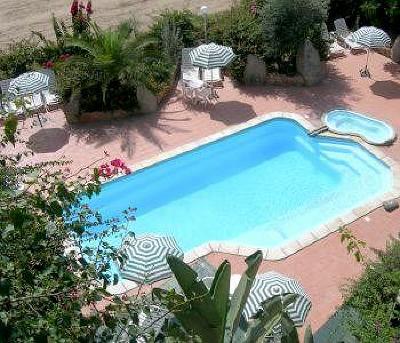 фото отеля Aparthotel Domus De Janas Sul Mare