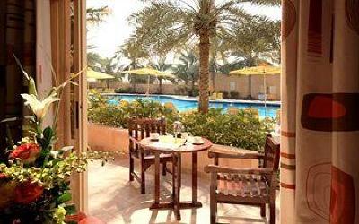 фото отеля Al Hamra Village Golf Resort