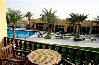 фото отеля Al Hamra Village Golf Resort