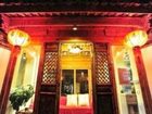 фото отеля Lijiang Bicycle and Sword Inn - Happy Inn