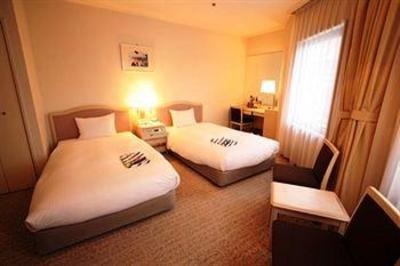 фото отеля Apa Hotel Takaoka Marunouchi