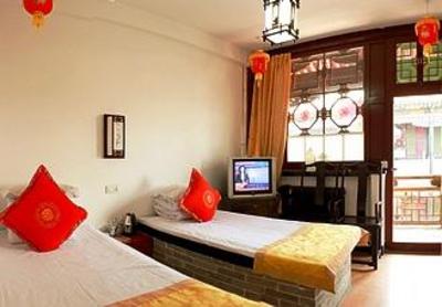 фото отеля Qingxinyuan Folk Hotel