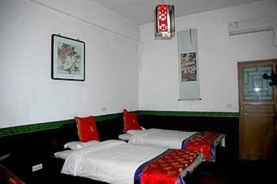 фото отеля Qingxinyuan Folk Hotel