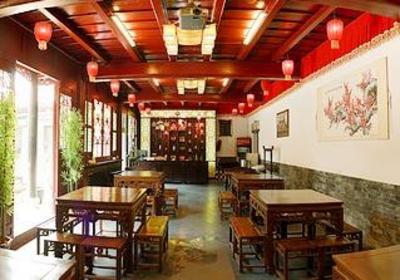 фото отеля Qingxinyuan Folk Hotel