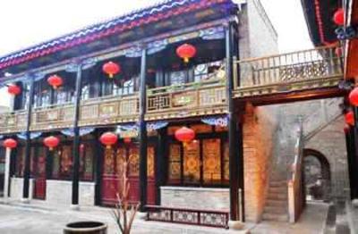 фото отеля Qingxinyuan Folk Hotel