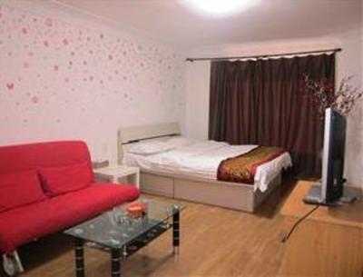 фото отеля Mingjie Apartment Hotel Dalian Xinghai Jiete