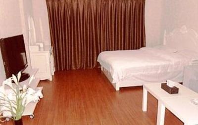 фото отеля Mingjie Apartment Hotel Dalian Xinghai Jiete