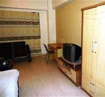 фото отеля Qingyi Apartment Hotel Xiamen