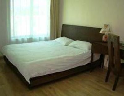 фото отеля Xishuangbanna North Bank Youth Hostel
