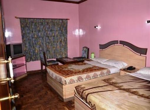 фото отеля Orchid Inn Ooty