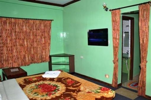 фото отеля Orchid Inn Ooty